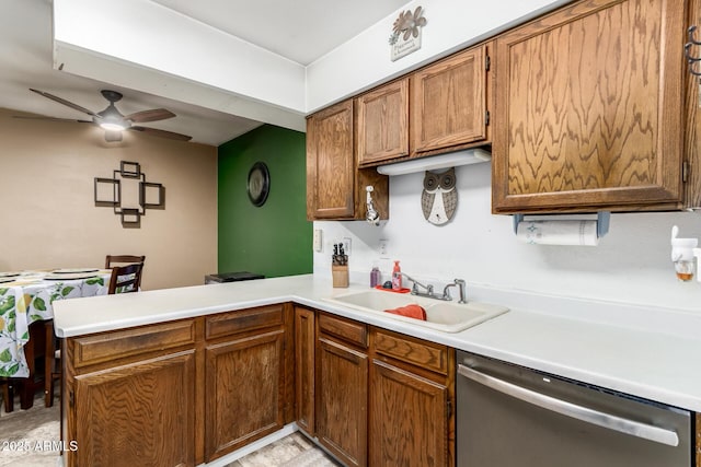1807 E Jamaica Ave, Mesa, AZ 85204 - kitchen featuring dishwasher, a peninsula, a ceiling fan, light countertops, and brown cabinetry