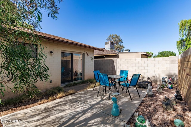 1807 E Jamaica Ave, Mesa, AZ 85204 - fenced backyard with a patio area and outdoor dining space