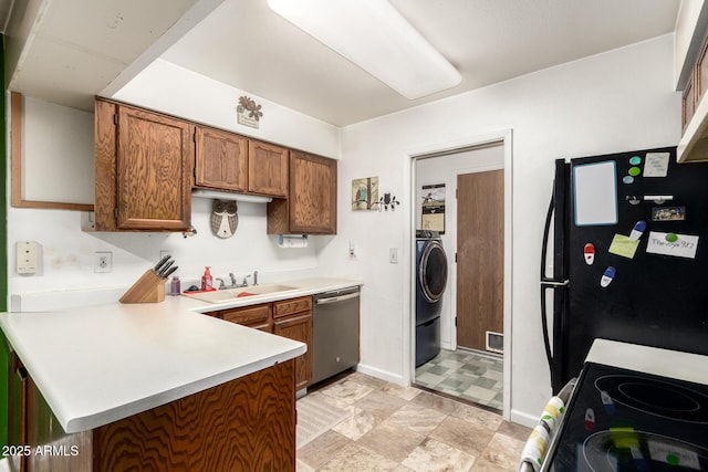 1807 E Jamaica Ave, Mesa, AZ 85204 - kitchen featuring dishwasher, freestanding refrigerator, light countertops, a peninsula, and brown cabinets