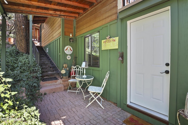 entrance to property with a patio