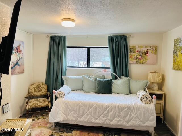 bedroom with a textured ceiling