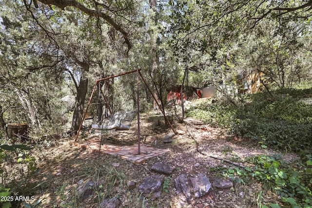 view of nature featuring a wooded view