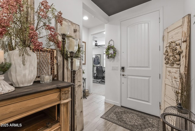 entryway featuring light wood-style floors