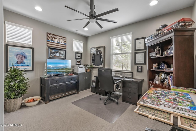 carpeted office with recessed lighting and a ceiling fan