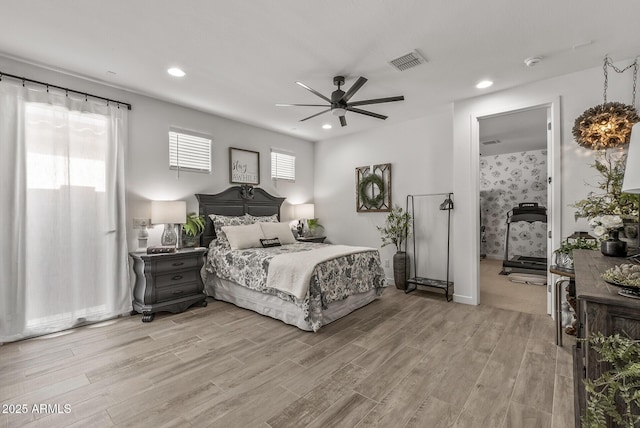 bedroom featuring a ceiling fan, recessed lighting, visible vents, and light wood finished floors