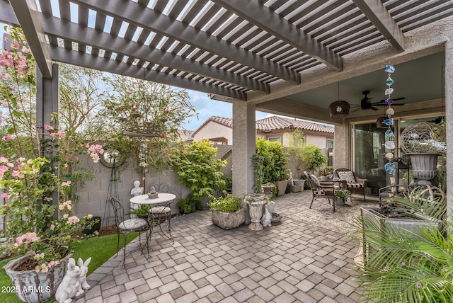 view of patio / terrace featuring a pergola, a ceiling fan, and fence