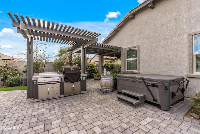 view of patio / terrace featuring area for grilling, a pergola, and a hot tub