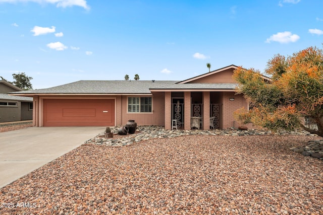 single story home featuring a garage