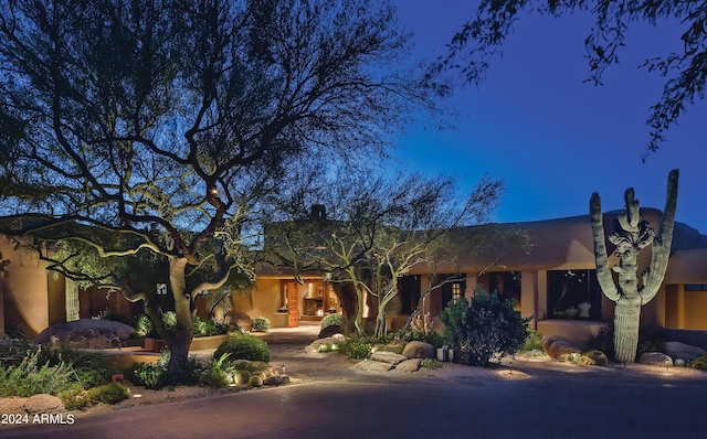 view of adobe home