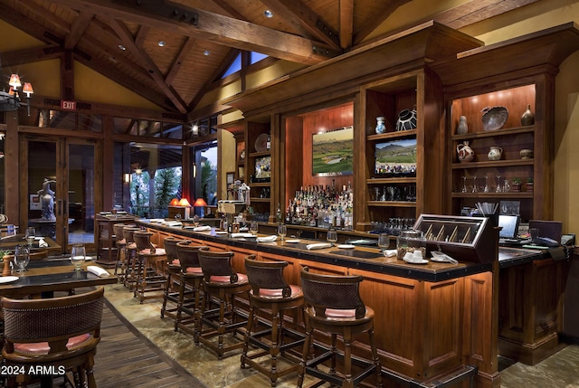 bar with dark hardwood / wood-style flooring, vaulted ceiling with beams, and wood ceiling