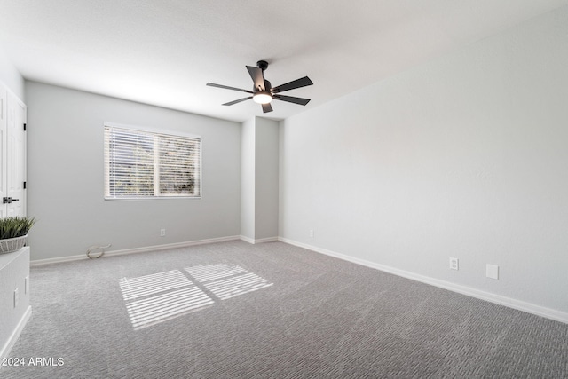 unfurnished room featuring carpet flooring and ceiling fan