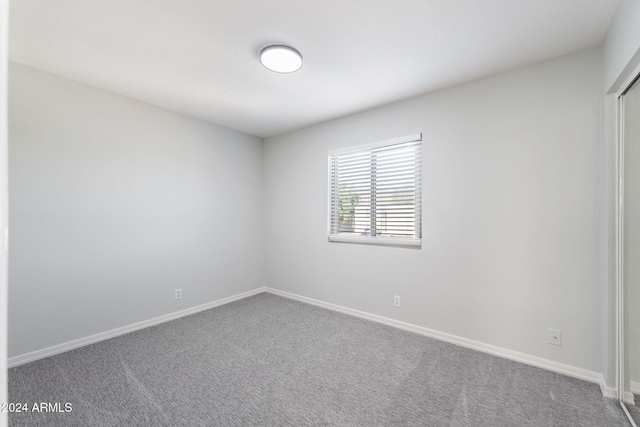 unfurnished room with carpet floors