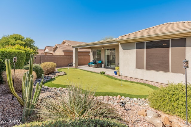 view of yard with a patio and fence