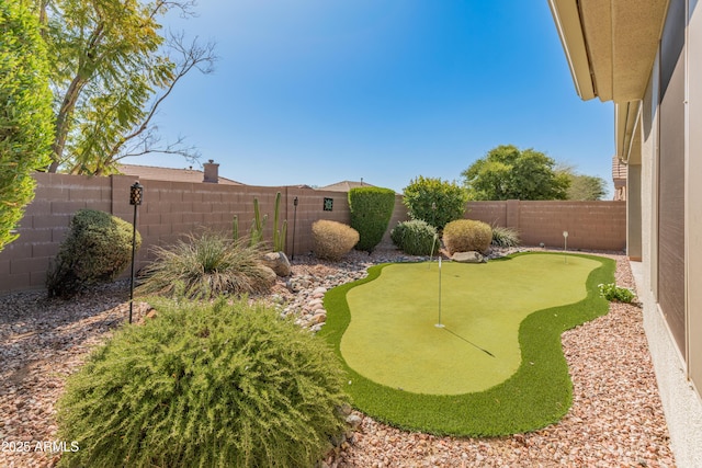 view of yard featuring a fenced backyard