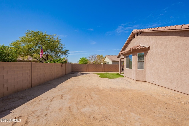 view of yard featuring a fenced backyard
