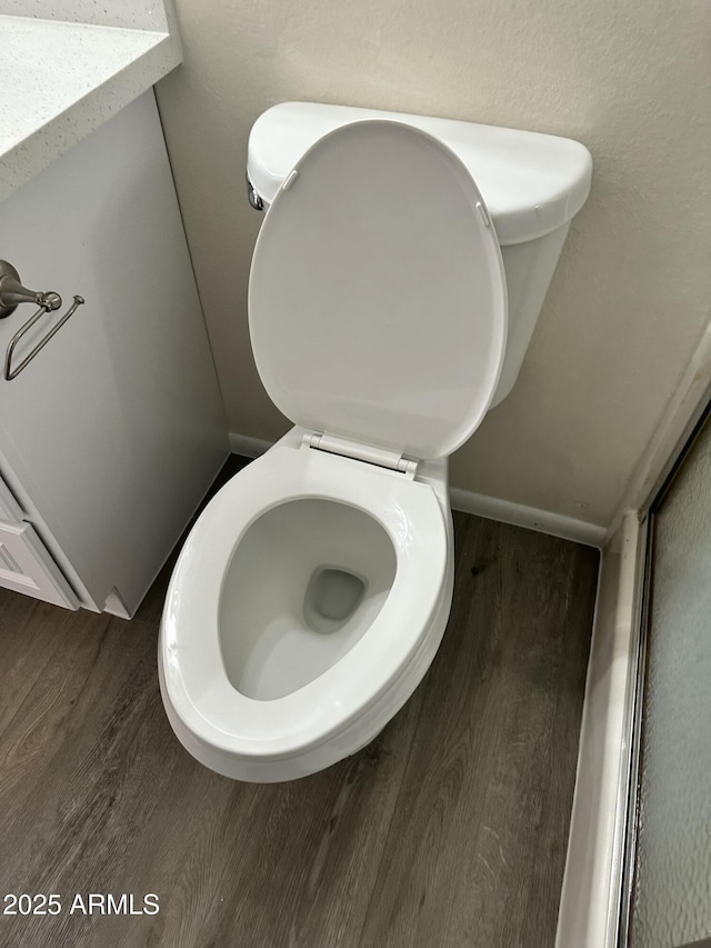 6120 N 30th Ave, Phoenix, AZ 85017 - bathroom with wood finished floors and toilet