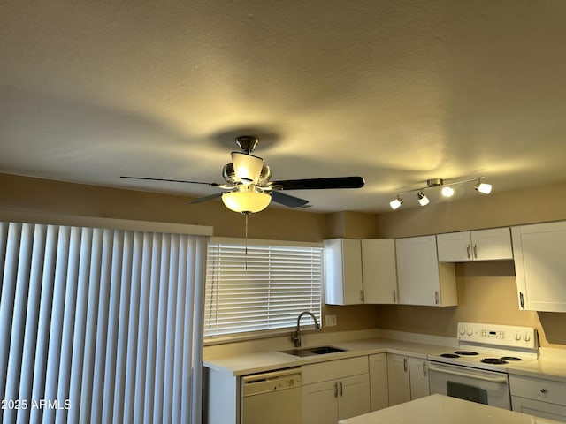 6120 N 30th Ave, Phoenix, AZ 85017 - kitchen with white appliances, a sink, a ceiling fan, white cabinetry, and light countertops