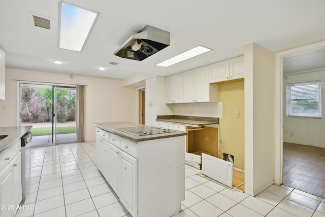 8411 E Via De Jardin, Scottsdale, AZ 85258 - kitchen featuring electric stovetop, ventilation hood, a center island, white cabinetry, and light tile patterned flooring