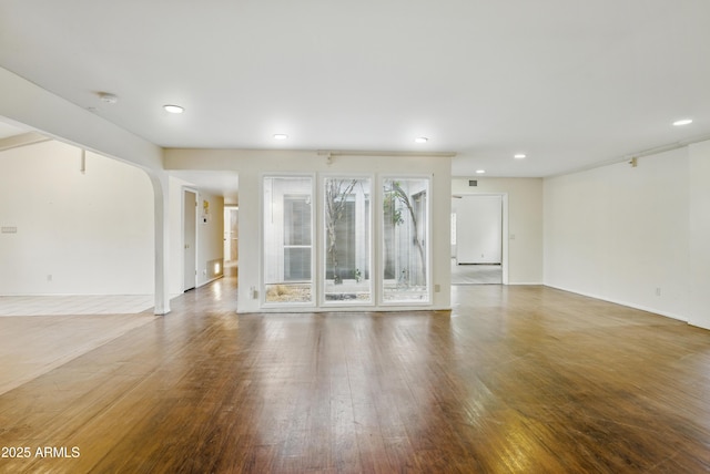 8411 E Via De Jardin, Scottsdale, AZ 85258 - unfurnished living room with wood finished floors and recessed lighting