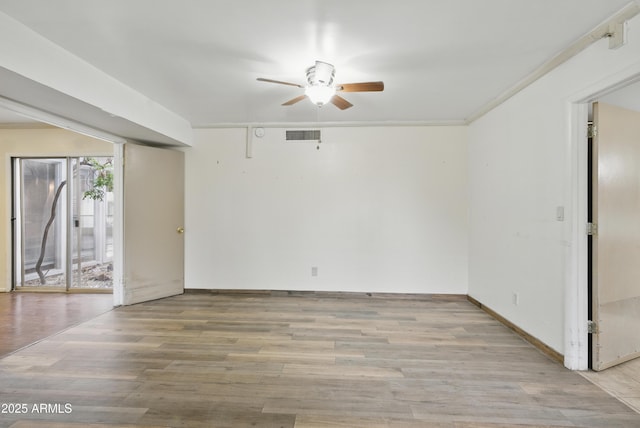 8411 E Via De Jardin, Scottsdale, AZ 85258 - empty room with ceiling fan and light wood-type flooring