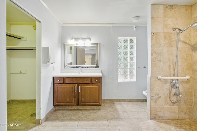 8411 E Via De Jardin, Scottsdale, AZ 85258 - full bath with tiled shower, vanity, and tile patterned floors