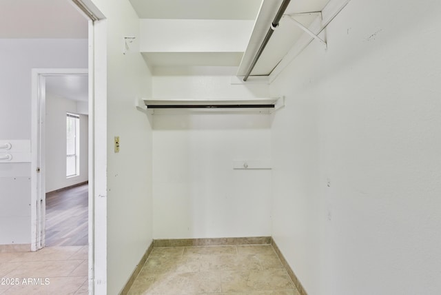8411 E Via De Jardin, Scottsdale, AZ 85258 - spacious closet with light tile patterned floors
