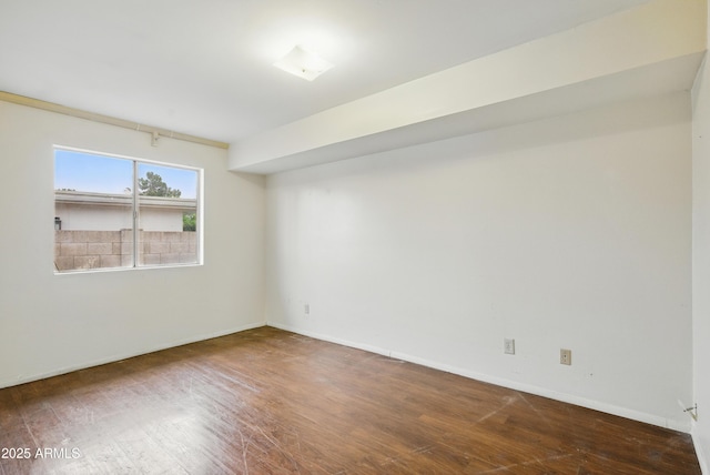 8411 E Via De Jardin, Scottsdale, AZ 85258 - empty room featuring wood finished floors and baseboards