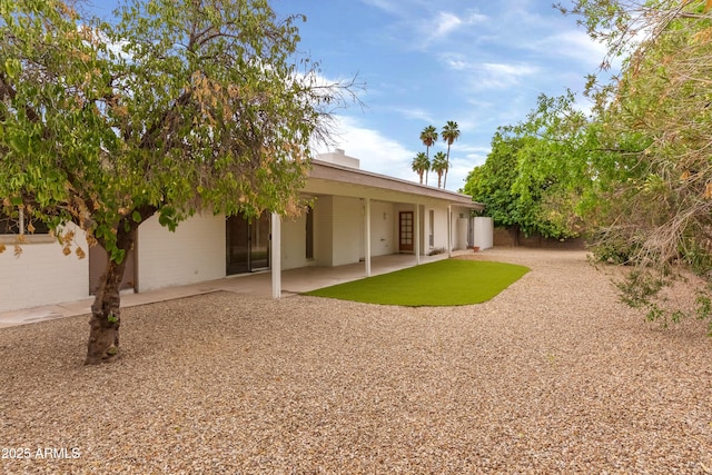 8411 E Via De Jardin, Scottsdale, AZ 85258 - rear view of property featuring a patio area