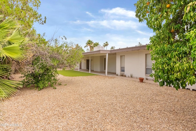 8411 E Via De Jardin, Scottsdale, AZ 85258 - back of property with a patio and concrete block siding