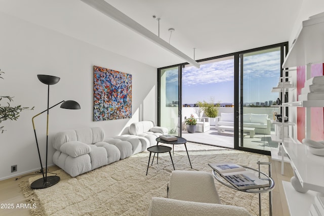 312 E Windsor Ave Unit 6, Phoenix, AZ 85004 - living area featuring wood finished floors and floor to ceiling windows