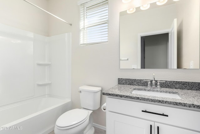 bathroom with toilet, shower / bathtub combination, and vanity