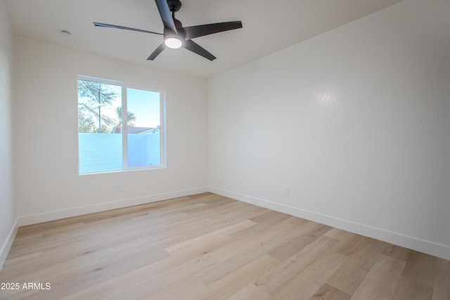 unfurnished room with light hardwood / wood-style floors and ceiling fan