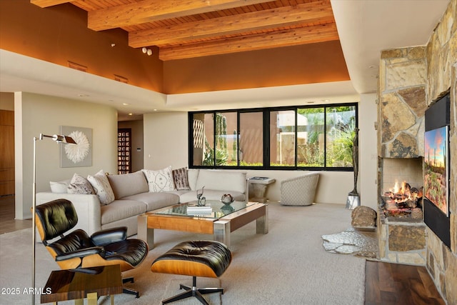 3120 Arroyo Hondo, Carefree, AZ 85377 - living room with a towering ceiling, wood ceiling, beam ceiling, and a stone fireplace