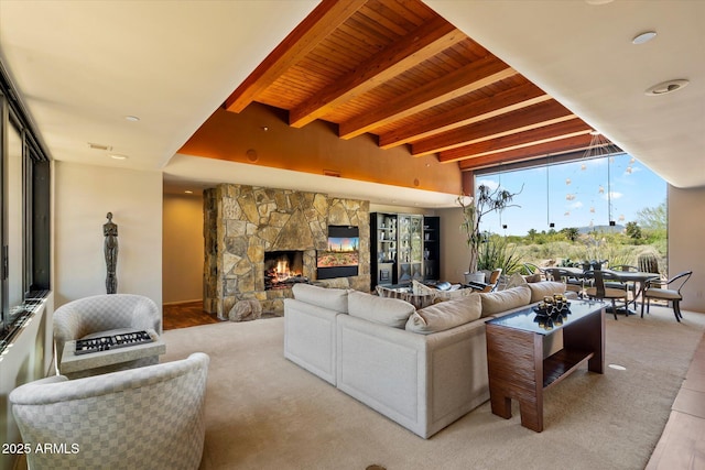 3120 Arroyo Hondo, Carefree, AZ 85377 - living room with a stone fireplace, beam ceiling, and wooden ceiling
