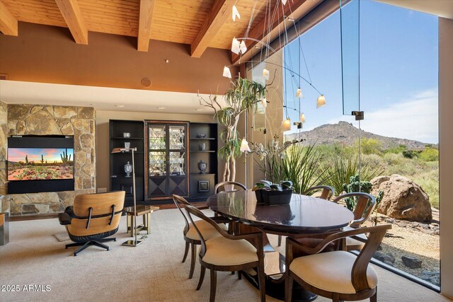 3120 Arroyo Hondo, Carefree, AZ 85377 - dining area featuring carpet flooring, a mountain view, wooden ceiling, and beam ceiling