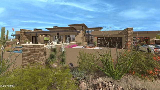 view of pool featuring pool water feature and a patio