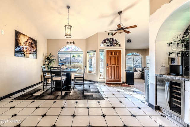 dining room featuring wine cooler and ceiling fan