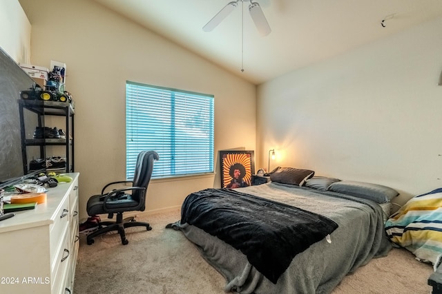 carpeted bedroom featuring vaulted ceiling and ceiling fan