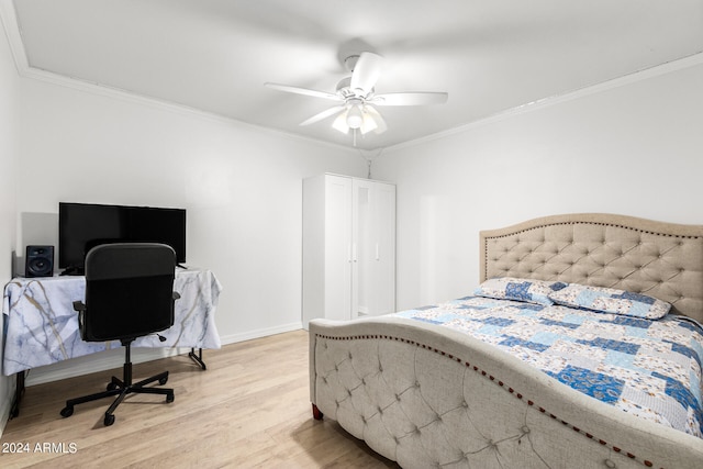 bedroom featuring light wood-type flooring, ceiling fan, and ornamental molding