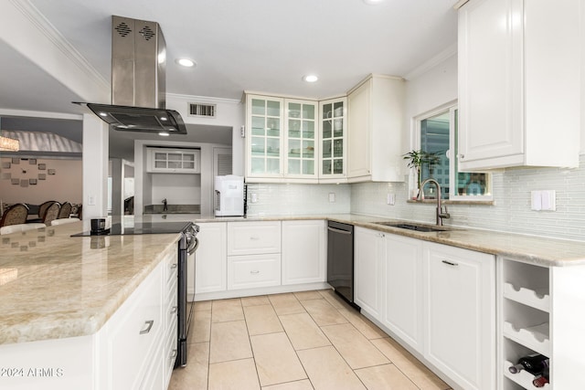 kitchen with light stone counters, white cabinetry, stainless steel appliances, and island range hood