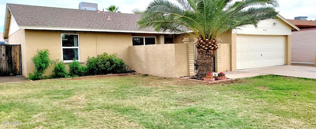 exterior space featuring fence, stucco siding, an attached garage, and driveway