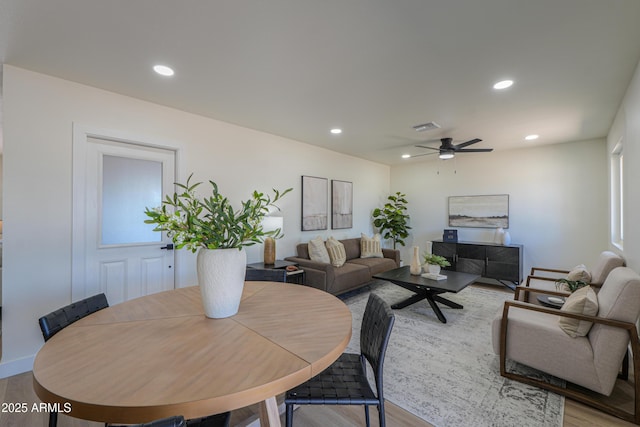 dining area with recessed lighting, a ceiling fan, light wood finished floors, and visible vents