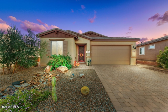 view of front of property featuring a garage