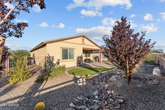 rear view of house with a patio area