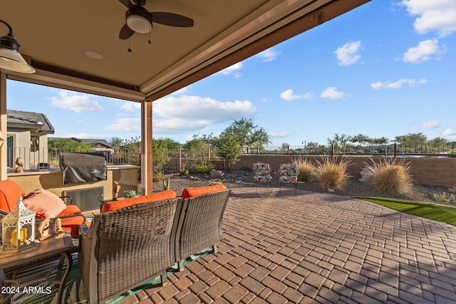 view of patio / terrace featuring ceiling fan and a grill