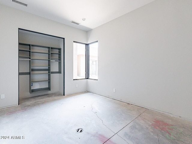 unfurnished bedroom with a closet