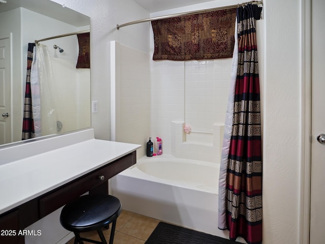 full bathroom featuring tile patterned flooring, vanity, and shower / bath combo