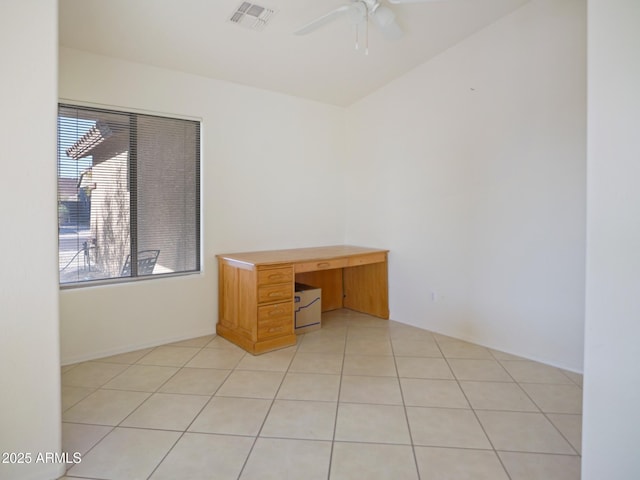 unfurnished office featuring light tile patterned floors, visible vents, and ceiling fan