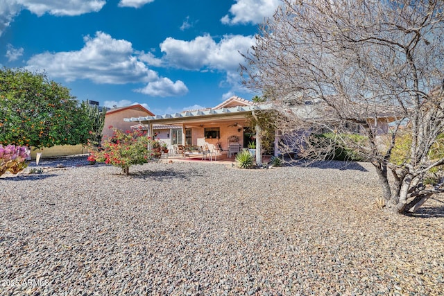 view of front of house with a pergola