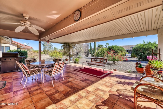 view of patio / terrace featuring ceiling fan and a grill